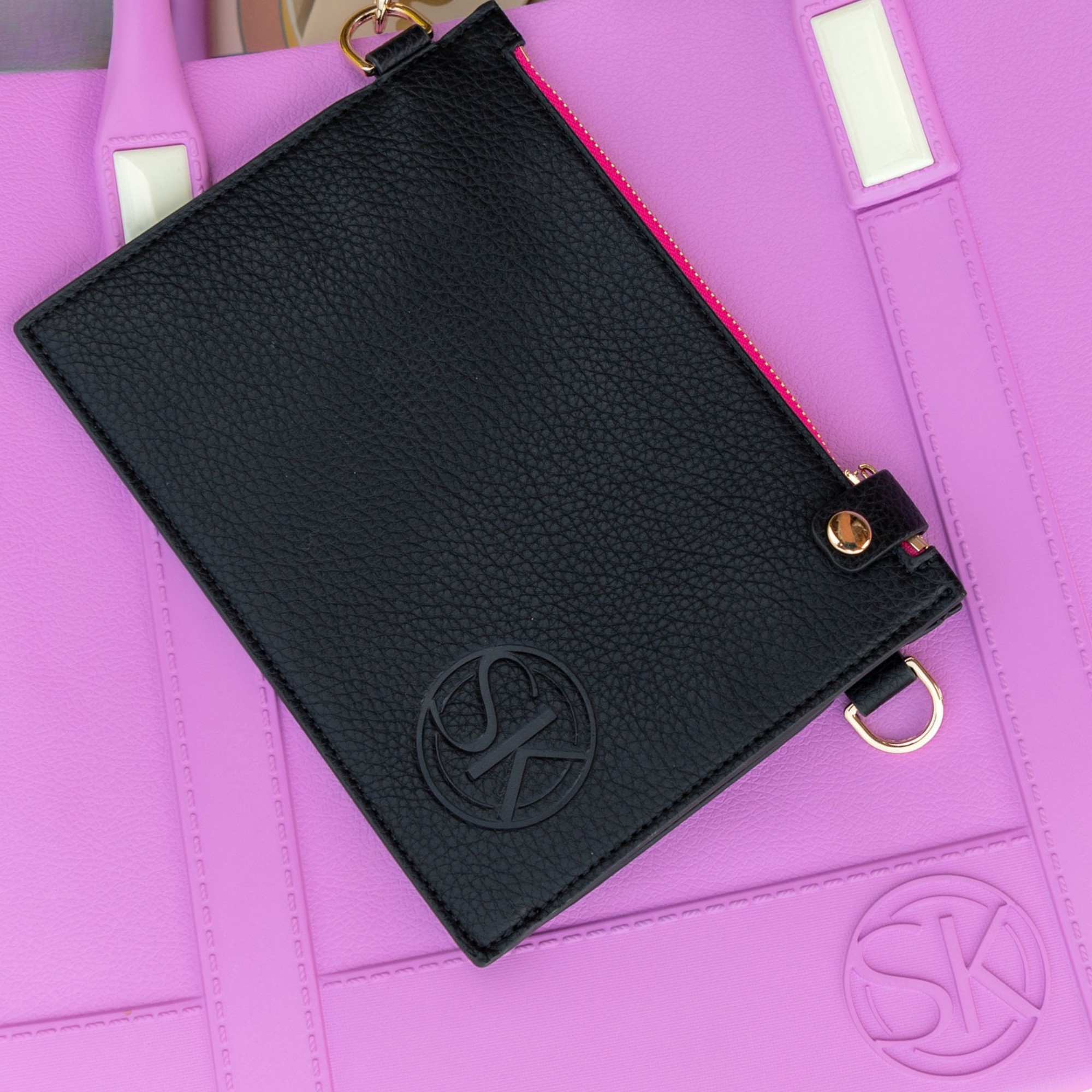 Black soft vegan leather clutch with gold accents 